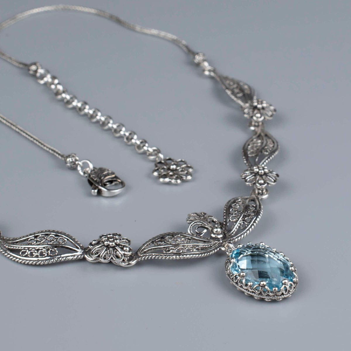Sterling Silver Blue Topaz Filigree Necklace – Paisley Design